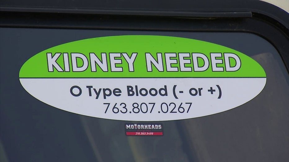 Bumper sticker with Leuer's phone number