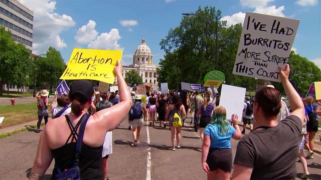 Abortion rights advocates march at Minnesota capitol