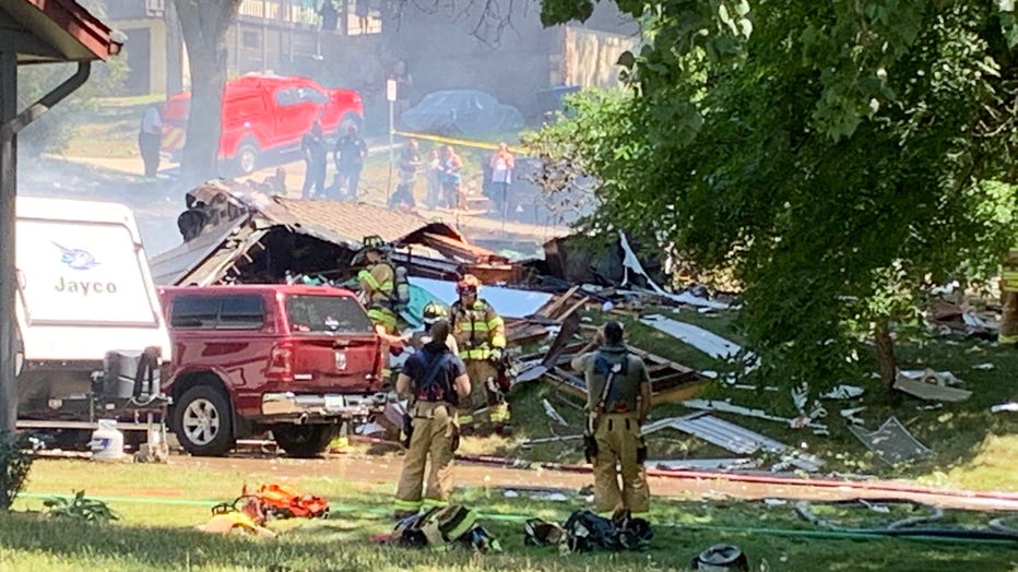 Husband and wife pulled from home after fire, collapse reported