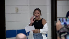 Olympic champion Suni Lee surprises students at St. Paul school