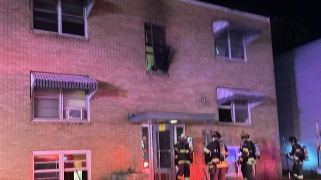 Minneapolis firefighters rescue adult and child from apartment fire; 20 residents displaced