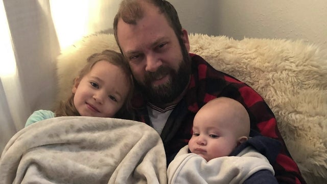 Dad 'basically paralyzed from the shoulders down within two days' by illness