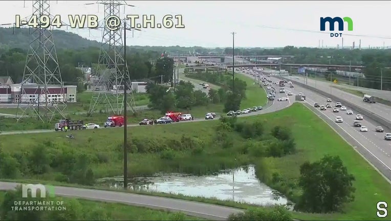 Emergency vehicles on an exit ramp of Highway 61