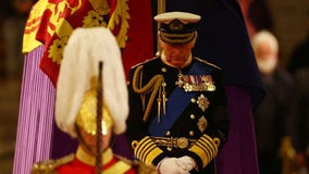 Queue to see queen's coffin hits 24-hour wait as King Charles, siblings hold vigil