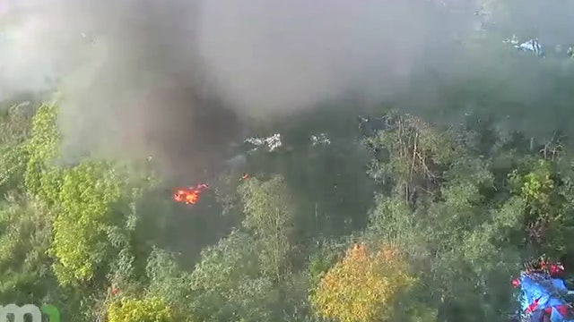 VIDEO: Firefighters battle blaze at homeless encampment in Northeast Minneapolis