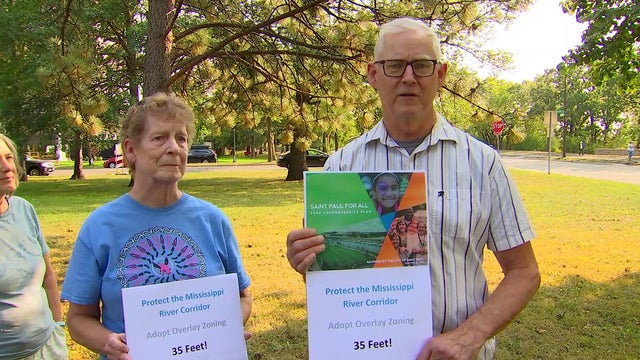 St. Paul neighbors say luxury apartment building would be so close they 'could pass sugar to them'