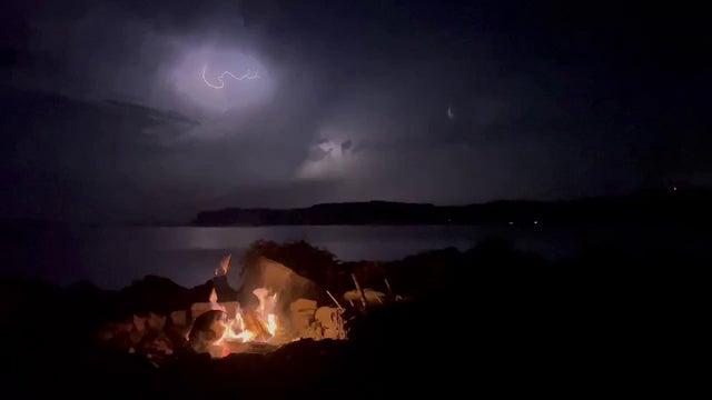Watch: Brilliant lightning flashes above campfire during Tuesday storms