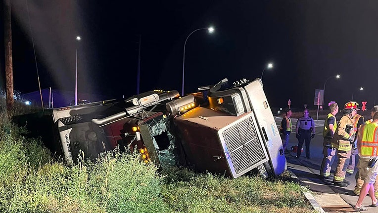 A semi rolled over on Highway 12 at County Road 90 in Maple Plain, Minnesota. (Image courtesy of West Hennepin Public Safety)