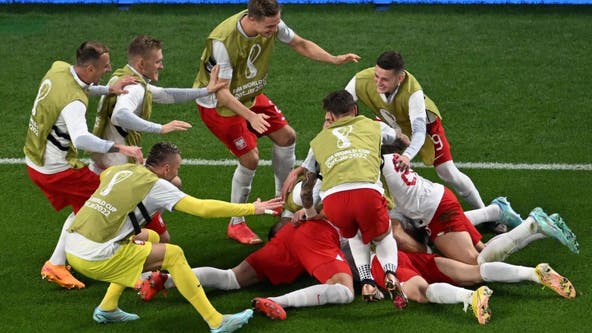 World Cup wins for Australia and Poland, with a score from Lewandowski