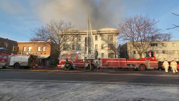 Minneapolis firefighters battling blaze at vacant apartment building with 'squatters' inside