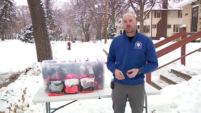 Hennepin County paramedics collect warm winter gear for the homeless