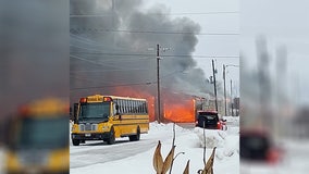 Large fire burns through school bus garage in Isanti County