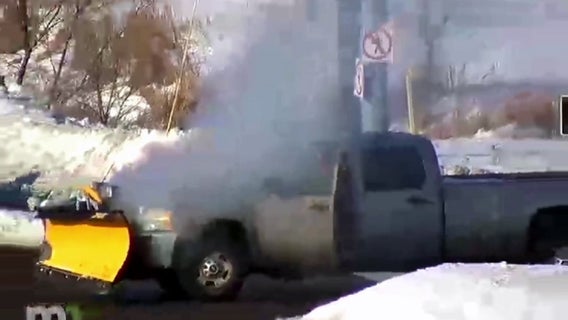 Plow truck catches fire along I-35E after fleeing deputies in Isanti County