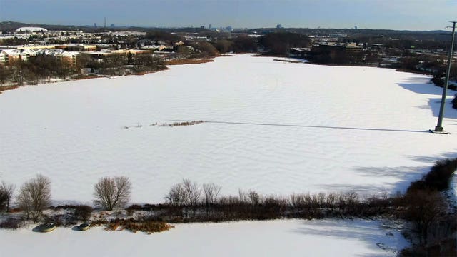 Heavy snow prompts thin ice warnings