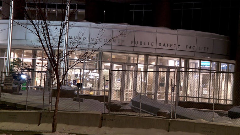 Police put fencing up in front of the Hennepin County Public Safety building and in front of police precincts throughout Minneapolis on Friday. (FOX 9)