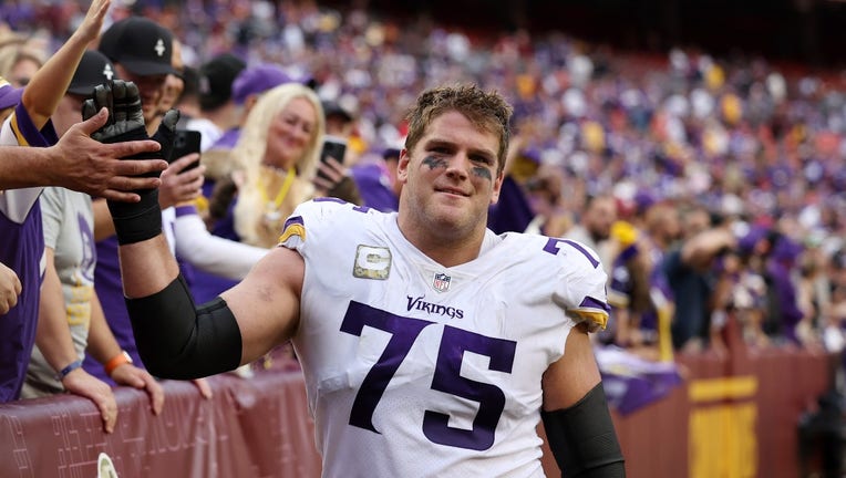 Minnesota Vikings offensive tackle Brian O'Neill (75) blocks