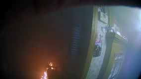 Bodycam video shows police rescue woman from fire in Sauk Centre