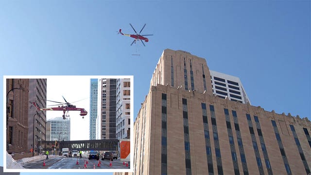 Watch: Helicopter hovers around buildings in downtown Minneapolis