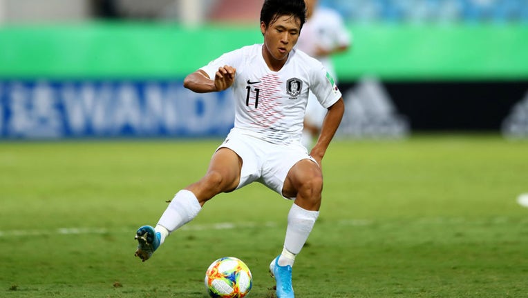 Sangbin Jeong of the Korean Republic runs with the ball during the FIFA U-17 World Cup Brazil 2019 round of 16 match between Angola and the Korea Republic at Estadio Olimpico de Goias on November 05, 2019 in Goiania, Brazil. (Photo by Martin Rose via Getty Images)