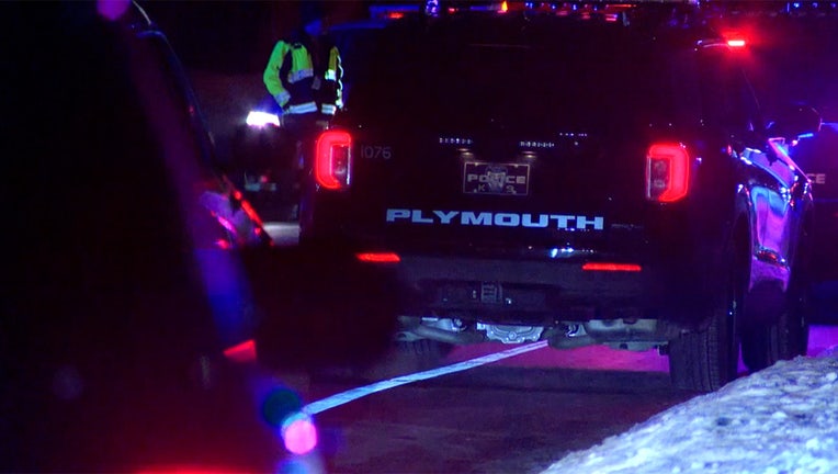 Plymouth police investigating the scene of a shooting on the 5800 block of Oakview Lane North on Saturday night. (FOX 9)