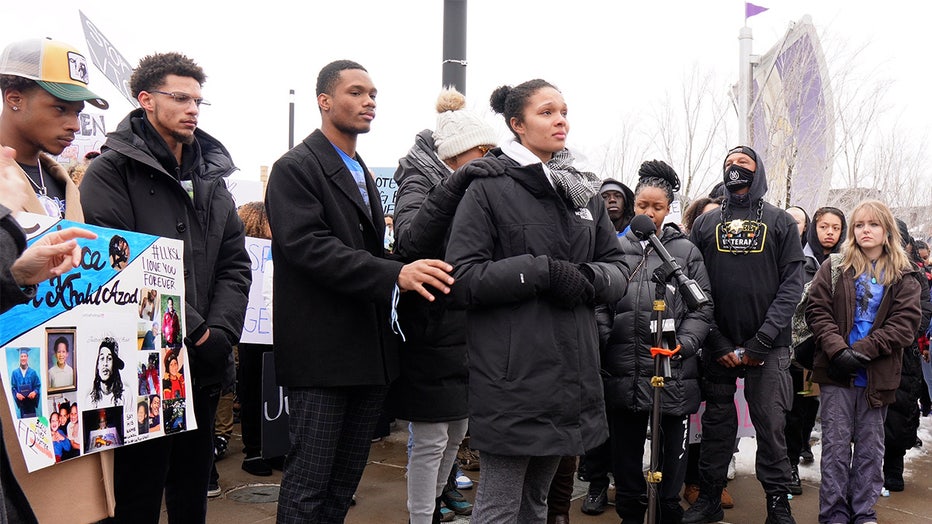 Ayisha Johnson, the sister of Khalil Ahmad Azad, is comforted by her mother and a student organizer during a press conference and rally held in downtown Minneapolis on Monday. (Jared Goyette / FOX 9)