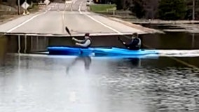 Kayakers cross flooded Minnesota road: 'So Minnesotan'