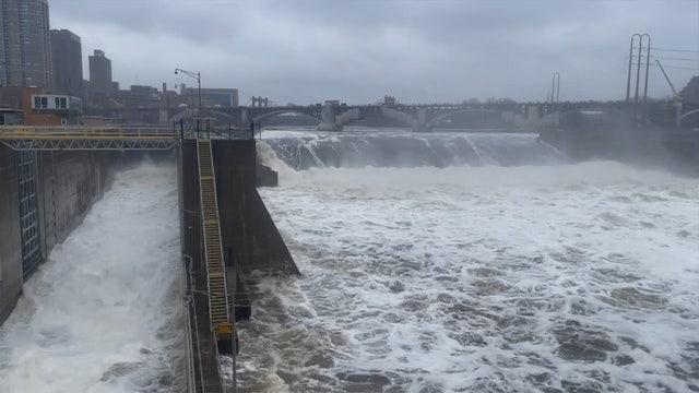 Rising waters transform Minneapolis' St. Anthony Falls into thunderous roar
