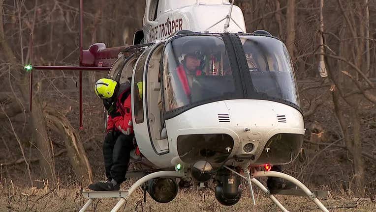 Law enforcement on the scene after two people were rescued from Vermillion Falls.