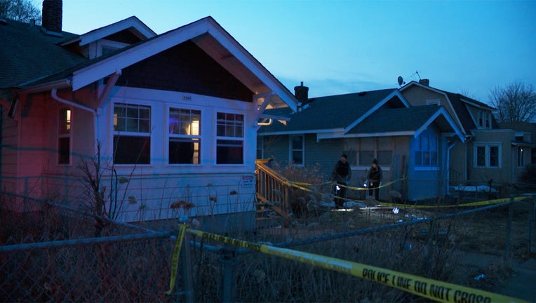 Officers with the Minneapolis Police Department’s Forensic Division investigate the scene of a shooting on Russell Avenue in north Minneapolis on the morning of Saturday, April 9, 2023. (Pool photo)