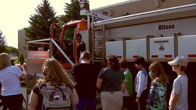 ‘Blizzo’ MnDOT snowplow visits Osseo school to meet those who named it