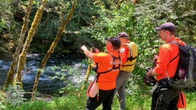 2 brothers presumed dead in Oregon after raft flips on river