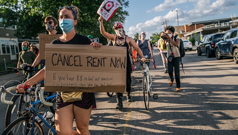 Demonstrators march in the street during the Cancel Rent and Mortgages rally on June 30, 2020 in Minneapolis, Minnesota. (Photo by Brandon Bell/Getty Images)