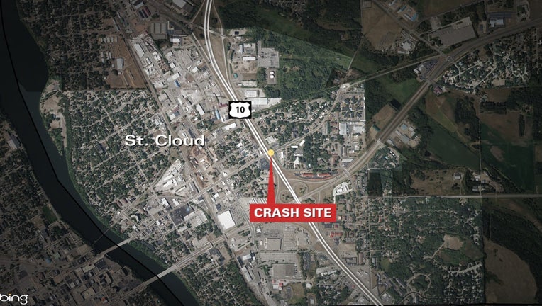 A 25-year-old woman was struck by a car while trying to cross Highway 10 in St. Cloud on Monday.