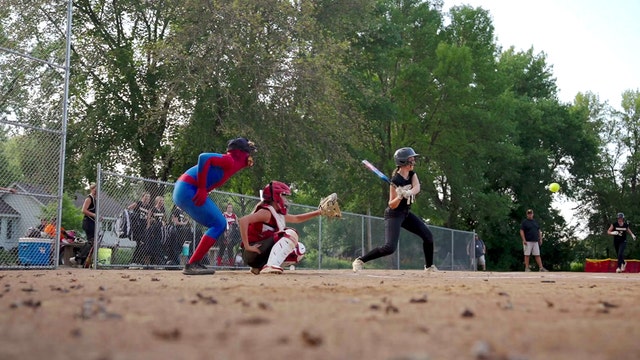 Umpire superhero for youth softball, baseball offers unusual positivity