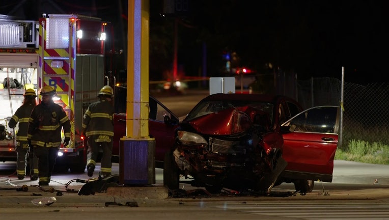 Minneapolis firefighters at the scene of a fatal DUI crash at Hiawatha Avenue and 26th Street (FOX 9)