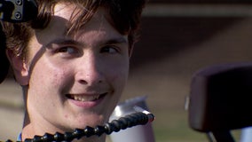 One year after accident, paralyzed football player attends first game