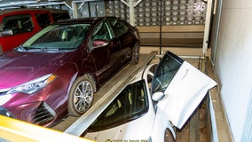 Passenger gets trapped in car crushed by automated rotating parking system