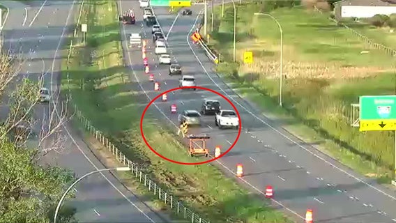 Driver plows into construction barrels, sending one into worker in Oakdale