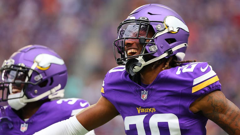 Arizona Cardinals wide receiver Davion Davis (10) runs down the field  during the first half of an NFL preseason football game against the  Minnesota Vikings, Saturday, Aug. 26, 2023, in Minneapolis. (AP