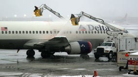 Delta Air Lines employees work up a sweat at boot camp, learning how to de-ice planes