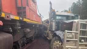 Train crashes into logging truck in St. Louis County