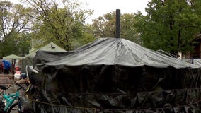 Minneapolis homeless encampment building yurts for winter protection