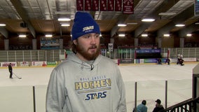 Minnesota hockey player paralyzed from hit, walks again