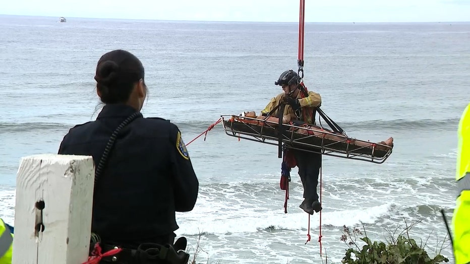 Woman rescued after falling in hole