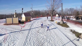 Skiers, spectators make most of warm weather at cross country meet in Maple Grove