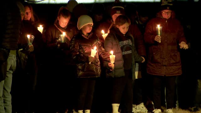 Perry High School shooting: Mourners fill church to remember the principal who risked life to save kids