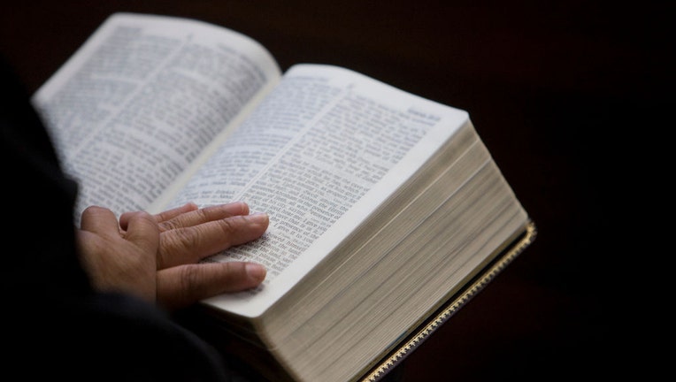 Person-reading-the-bible.jpg