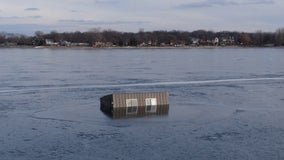 Ice house slowly sinking on Prior Lake
