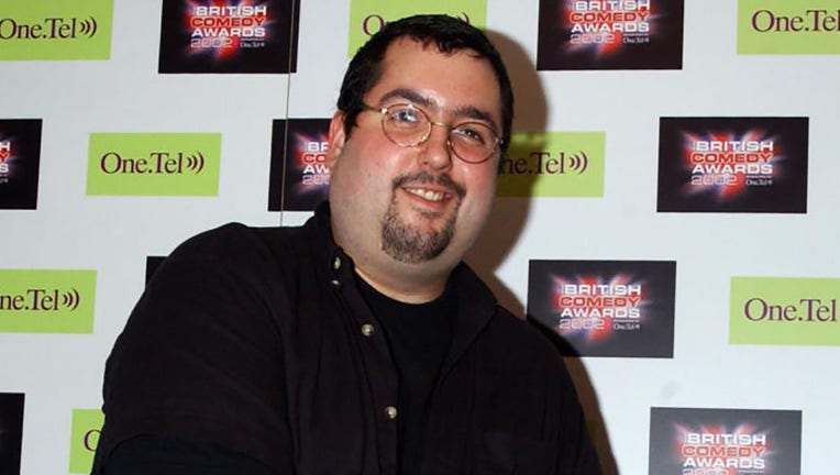 FILE - Comedian Ewen Macintosh is pictured at a launch party for The British Comedy Awards in London in 2002. (Photo by Yui Mok - PA Images/PA Images via Getty Images)