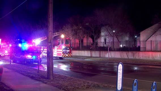 Minneapolis firefighters evacuate residents from burning townhome